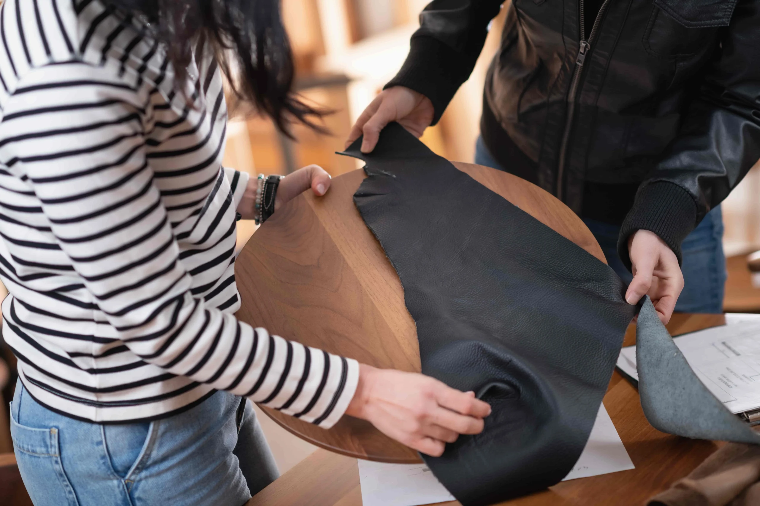 Designer choosing faux leather upholstery samples